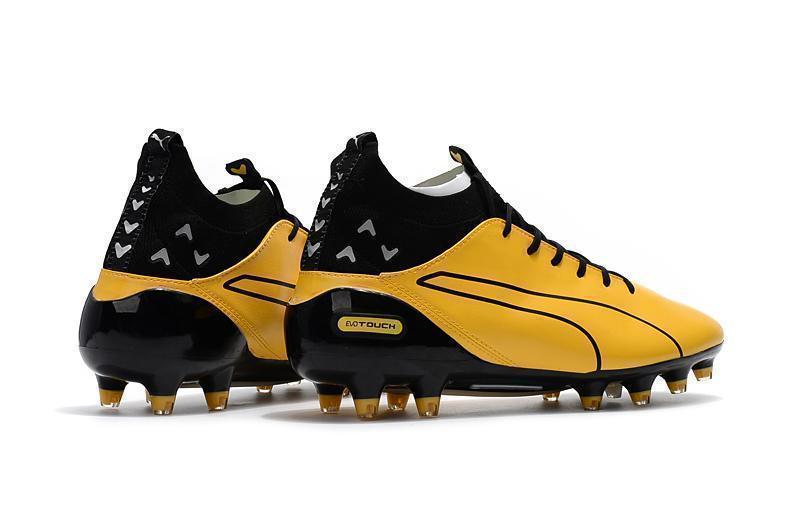 PUMA evoTOUCH Pro FG Soccer Cleats Yellow Gold Black